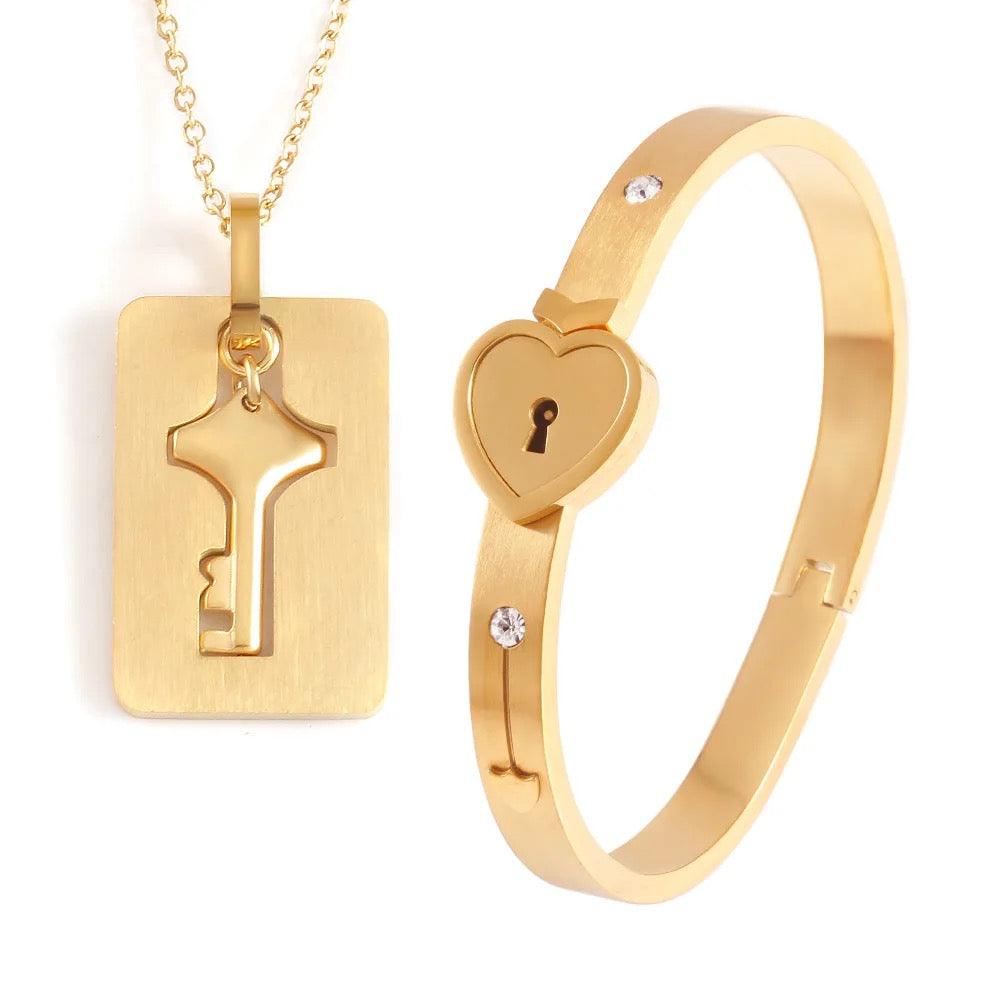 Stainless Steel Couples Lock Bracelet & Key Necklace Set.